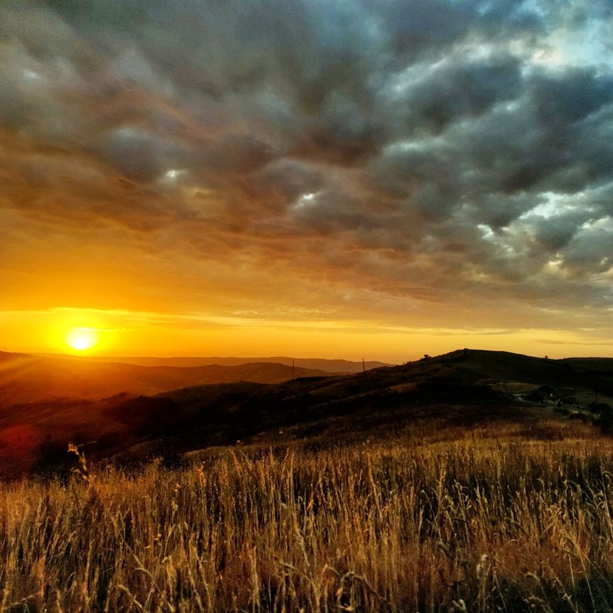 Sunrise at Tuscany fields